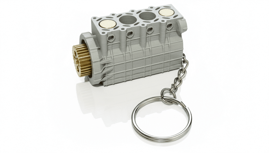 A 4-Cylinder Engine Keychain with Moving Pistons.