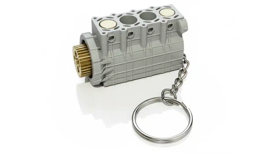 A 4-Cylinder Engine Keychain with Moving Pistons.