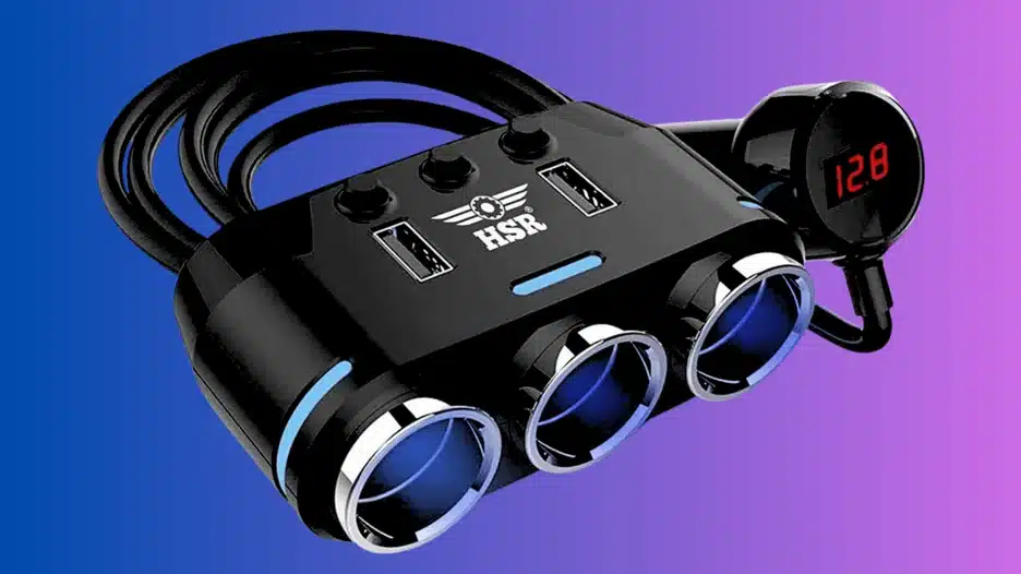 A black car charger accessory with three auxiliary power outlets and two USB ports, featuring blue accent lighting and a separate digital voltmeter display showing "12.8".