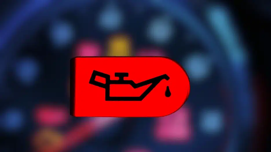 Red oil warning light icon illuminated on a car dashboard, indicating an engine oil or oil pressure alert that may require inspection or reset.