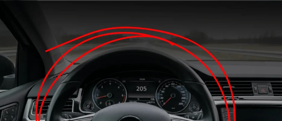 Car interior with steering wheel and dashboard, overlaid with red circular lines indicating vibration or issue.