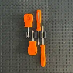 Automotive Accessories NA Small Screwdriver Attachment with Orange Screwdrivers in them.